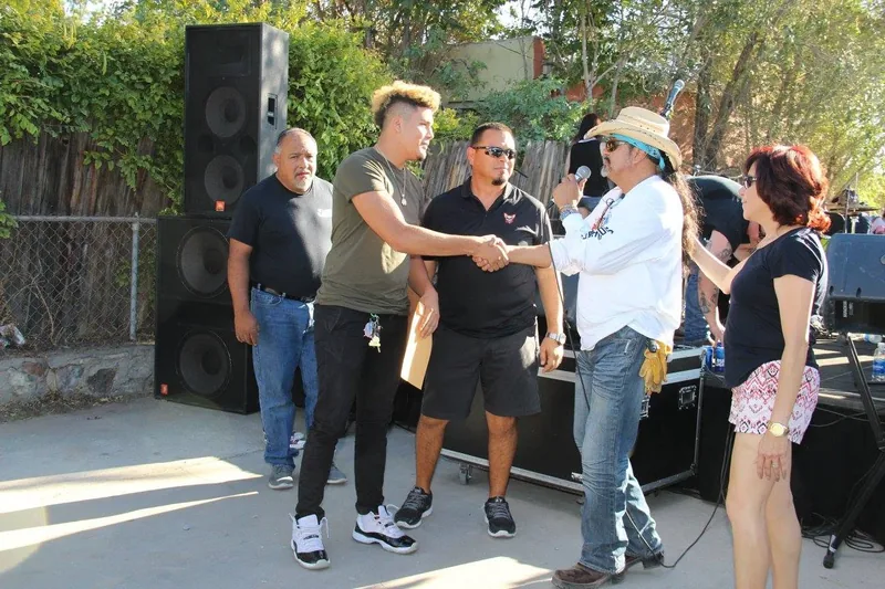 A scholarship presented to a recipient at a JLV Memorial Fund event